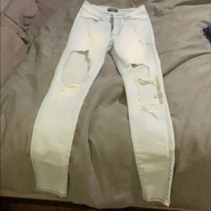 Fashion Nova Light wash destroyed jeans
